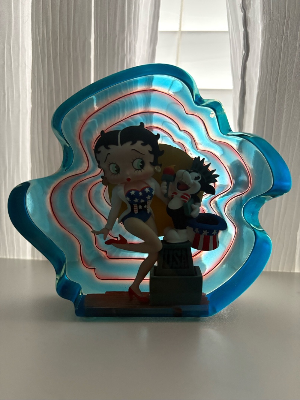 Betty Boop Figurine with Blue Resin Backdrop